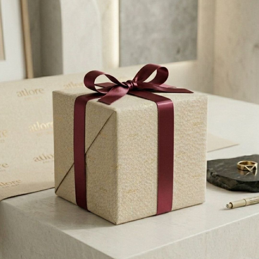 a gift wrapped in premium wrapping paper and satin ribbon
